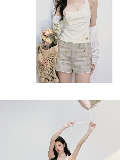 Sleeveless Top With Flower Embellishments