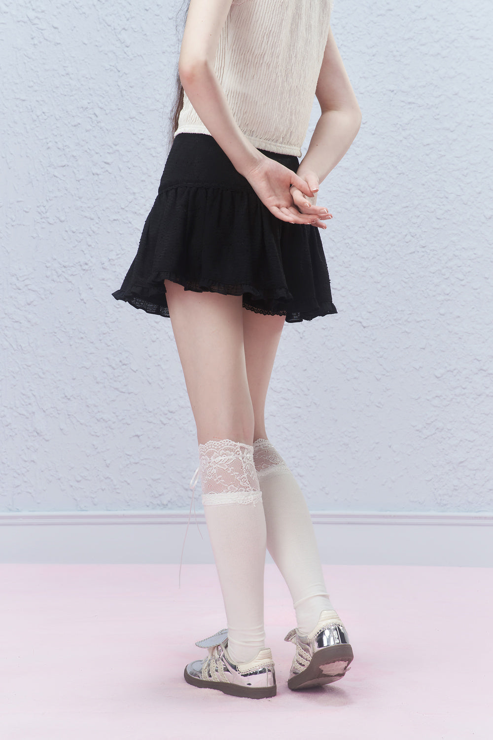 Ruffled Mini Skirt With Ruched Detail