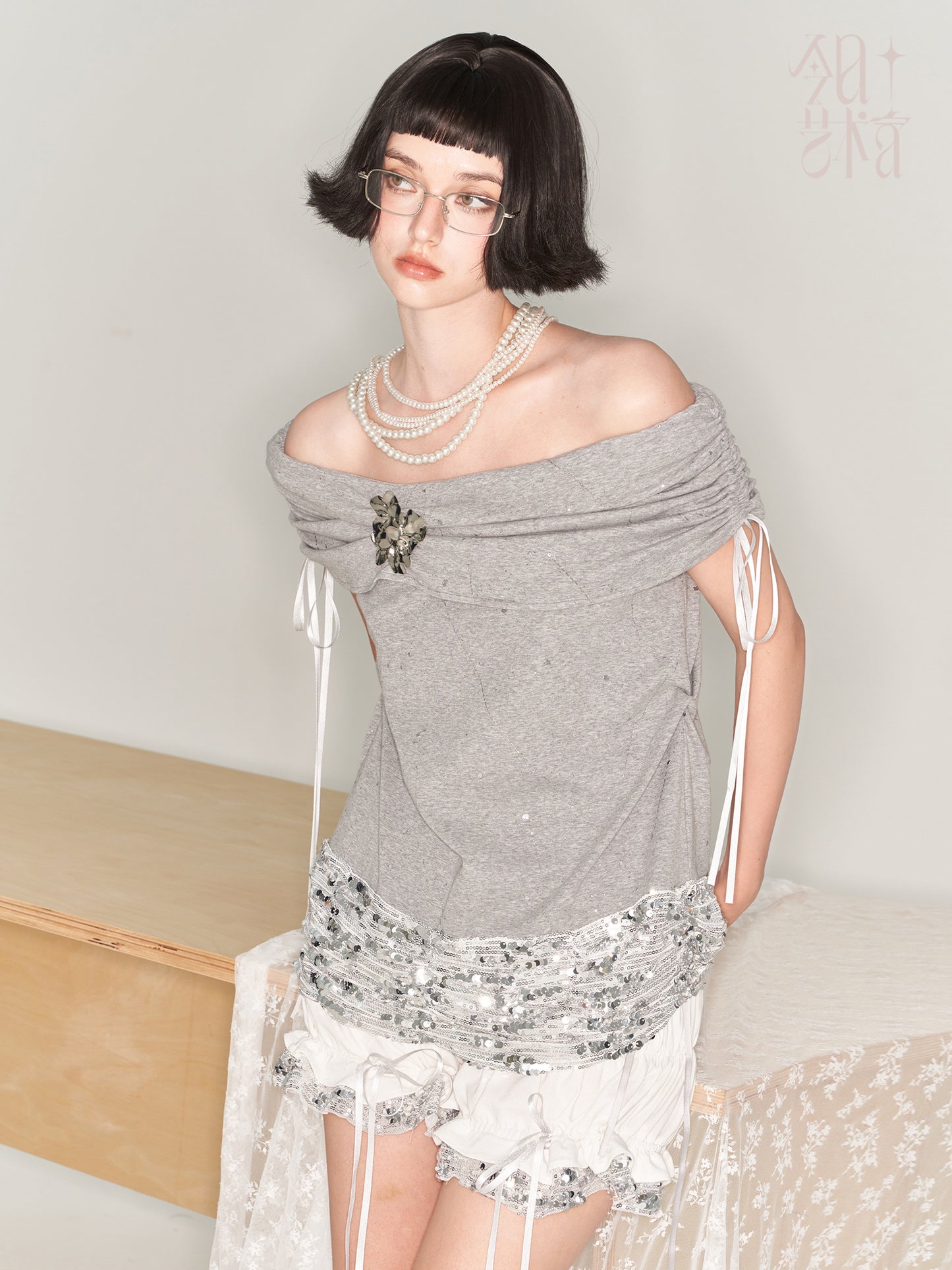Ruched Shorts With Sequin Metallic Hem